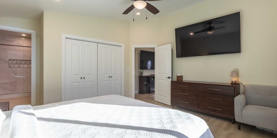 Image of part of the great room remodeled into a bedroom with bathroom in Reno, NV by M&G Construction