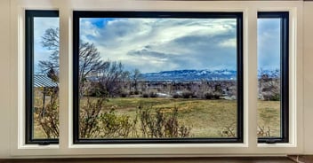 Image of a window in a home remodel by M&G Construction showing the Reno, NV landscape