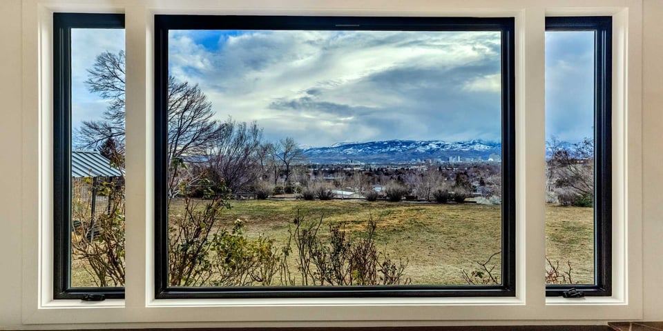 Image of a window in a home remodel showing the Reno, NV landscape by M&G Construction