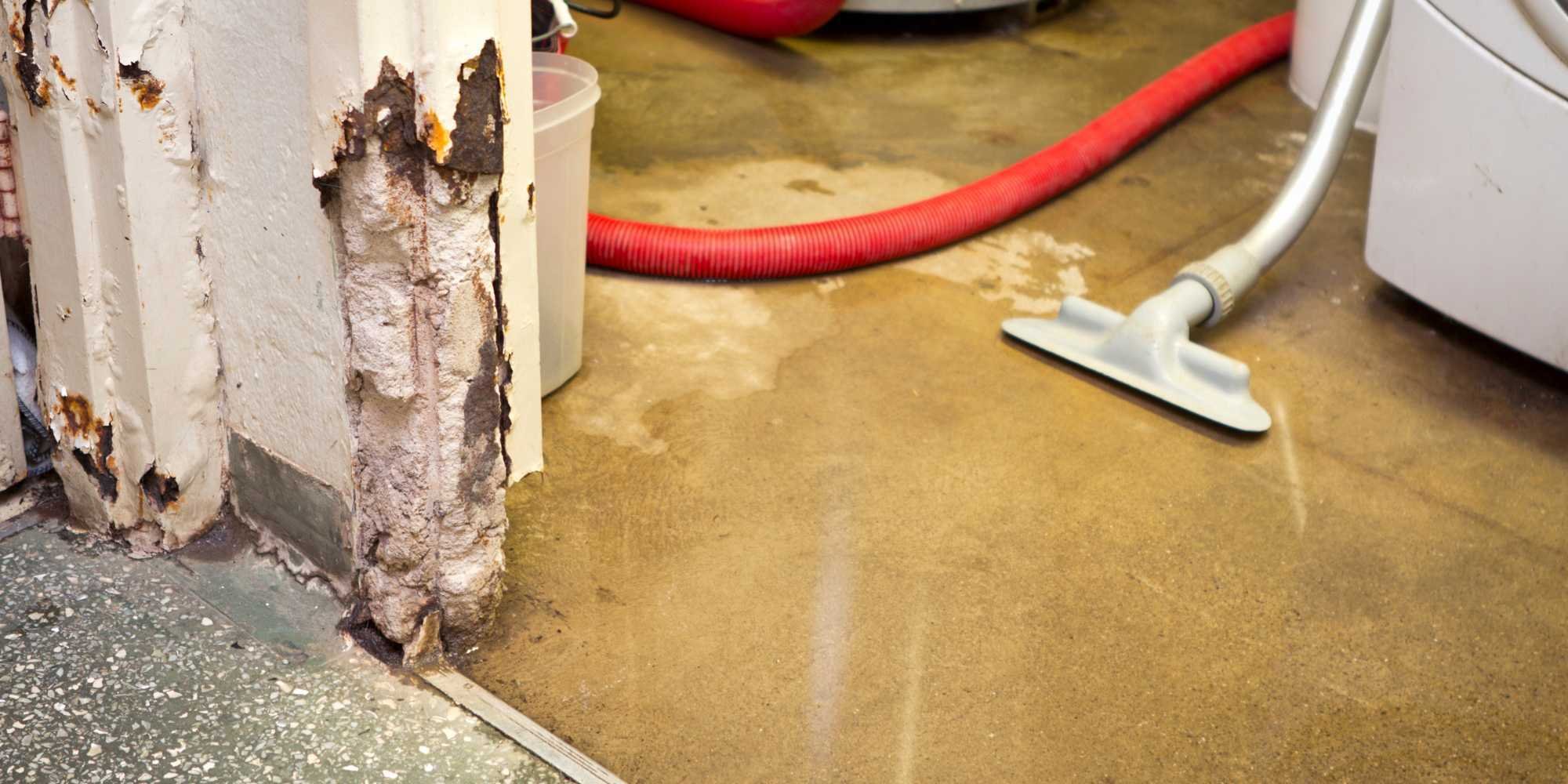 Water damage to a floor and wall in Reno, NV - M&G Construction