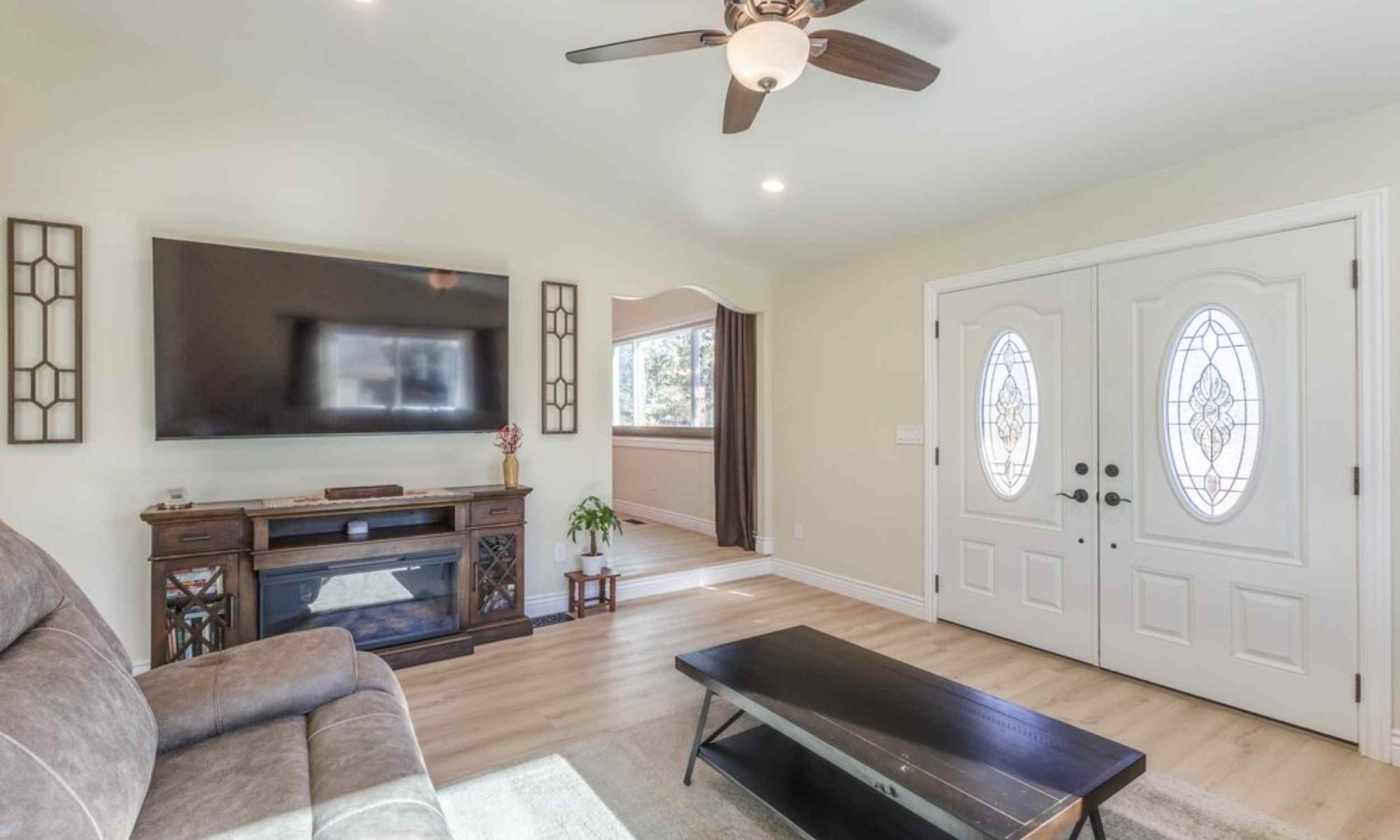 Image of the front room remodel with the archway hallway entrance in Carson City, NV by M&G Construction